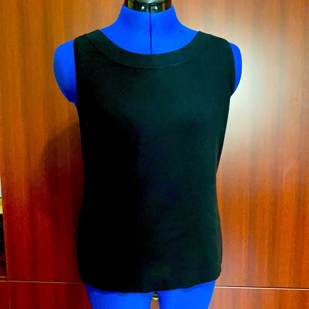 Chico’s black top. 73% Silk 27% Nylon.